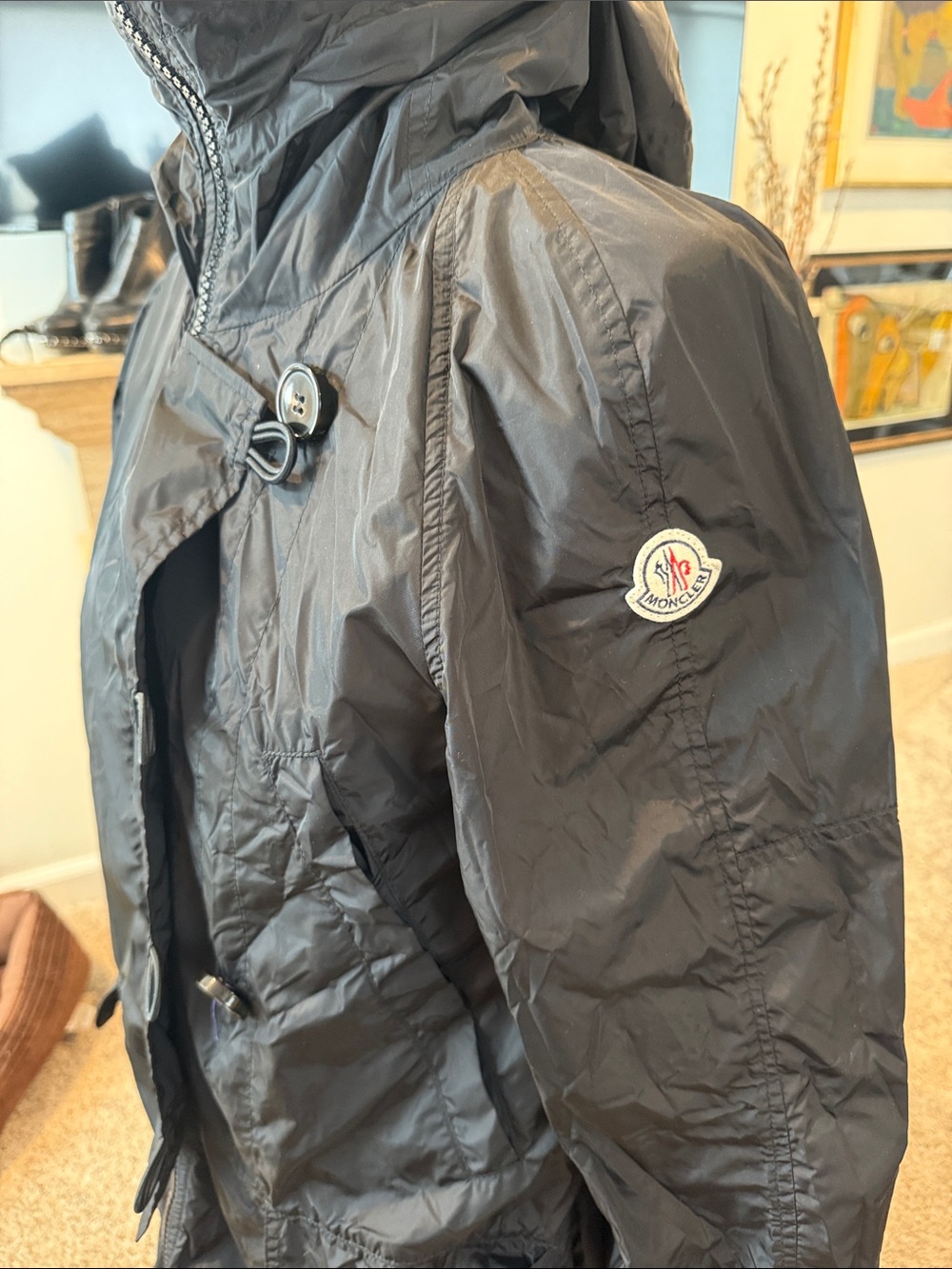Moncler Black Hooded Raincoat with Signature Sleeve Patch